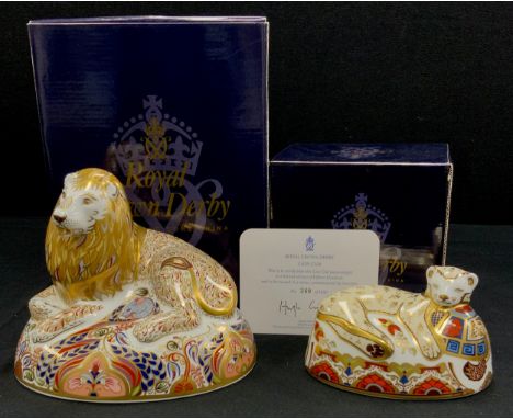 Royal Crown Derby paperweights including; Recumbent Lion,16cm high, silver stopper;  Lion Cub , limited edition 360/1500, gol
