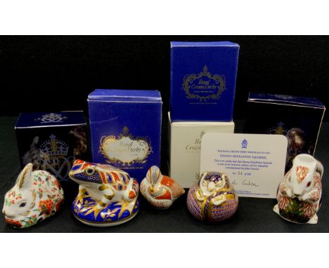 Royal Crown Derby paperweights including; Meadow Rabbit, gold stopper, Dormouse, gold stopper, Frog, silver stopper, Teal Duc