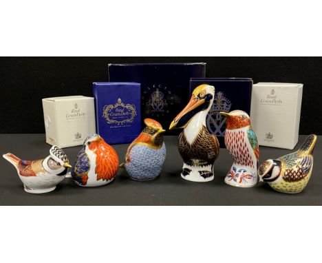 Royal Crown Derby paperweights; Brown Pelican, silver stopper, Blue Tit, gold stopper, Robin, gold stopper, Hummingbird, gold