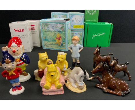 Royal Doulton from the Winnie the Pooh Collection including; Christopher Robin, Pooh Counting the honey pots, Winnie the Pooh