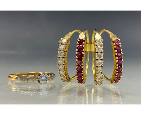 An illusion set diamond solitaire ring, 18ct gold shank, size K, 2g gross;  a four section paste yellow metal ring , indistin