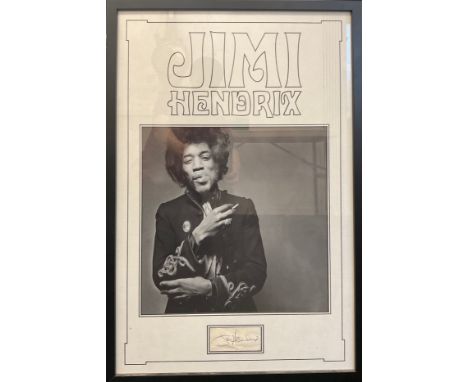 Rock/ Pop Memorabilia - Jimi Hendrix black and white photograph, mounted above an autograph book page, 82cm x 55cm overall, t