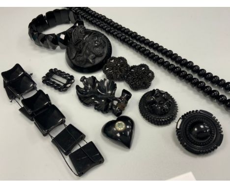 Victorian Mourning jewellery - carved Whitby jet brooches, panel bracelet, shoe buckle etc inc Romano Grecian bust Portrait ,