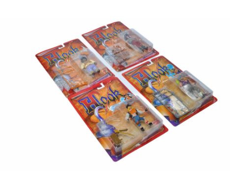Mattel group of Four Carded Hook figures, factory sealed with little sign of card wear. 