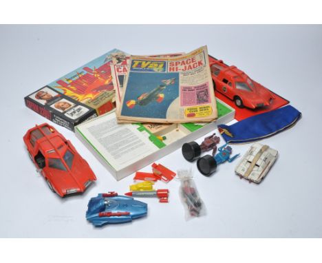 An assortment of vintage TV Related toys including Captain Scarlet and others. Some with signs of wear. 