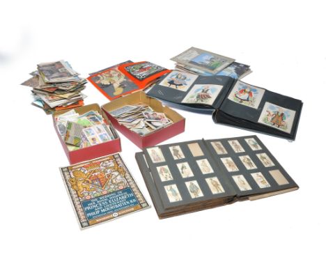 Further Vintage cigarette cards to include an album containing pre-1930 issues including Dickens Characters, Regiments etc pl