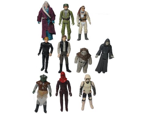 A group of original Kenner / Palitoy issue vintage Star Wars Action Figures. As shown. 