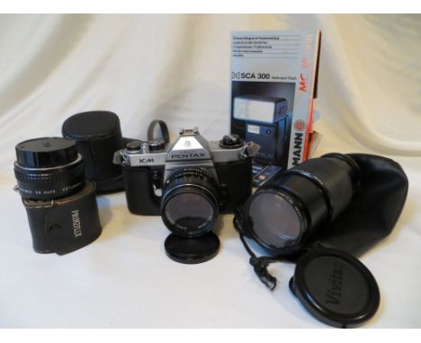 Pentax Asahi KM camera in case with Pentax, Prinzflex and Vivitar lenses, Luxon Skylight filter and Cullmann MC30 flash gun, 