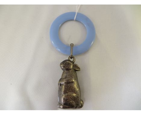 A vintage baby's rattle.