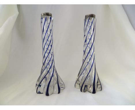 A pair of silver rimmed glass candlestick holders. London, 1905. Height: 18.5cm
