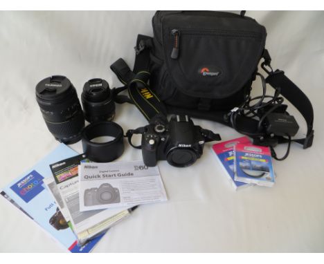 A Nikon D60 digital camera; a Nikon AF-S Nikkor 18-55mm lens; a Tamron AF 70-300mm lens; 2x filters and a Lowepro waterproof 