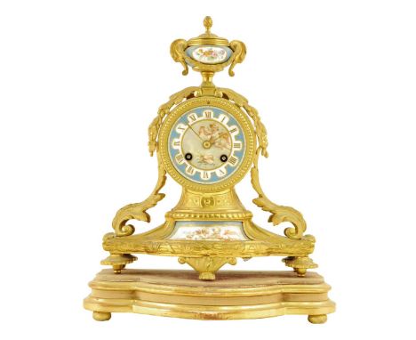 A porcelain and ormolu mantel clock, striking movement by Japy Freres no. 11396, numbered pendulum, dial and plaques decorate
