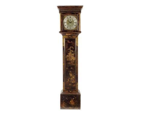 An early 18th century eight day black lacquered longcase clock, the 12 inch brass dial signed Claudius Du Chesne, London on t