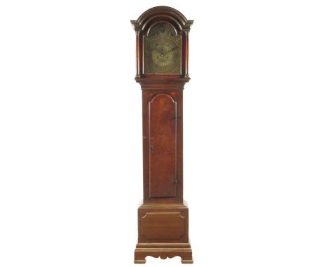 An eight day oak longcase clock, the 12 inch brass dial signed Willm. Tarry, Newport on a plaque in the matted centre, recess