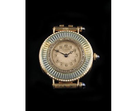 Cartier. A gold and enamel lady's wristwatch, silvered dial signed Cartier, Paris with Arabic numerals and moon hands, the da