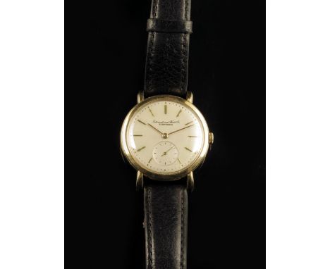 International Watch Co. An 18ct gold wristwatch, case no.1275940, silvered dial with raised gilt baton numerals, subsidiary s