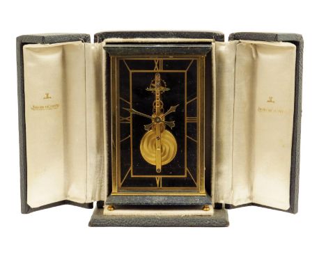 Jaeger LeCoultre. A gilt brass and simulated lapis lazuli mantel timepiece, signed on the front glass, the eight day inline m
