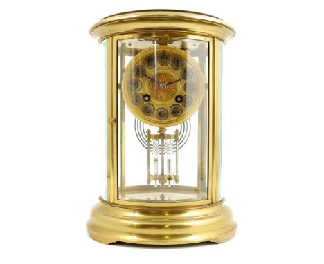 A French four glass mantel clock, gilt dial with silvered numeral reserves, the striking movement with mercury pendulum, in a