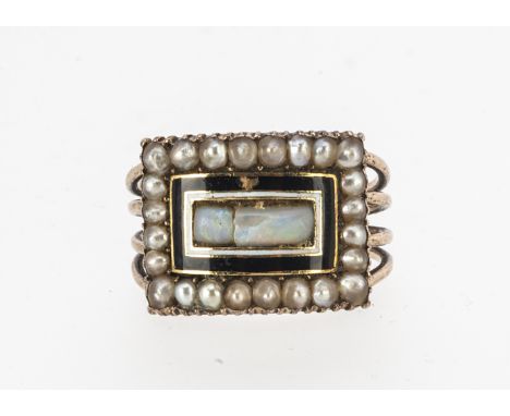 An early 19th century dated mourning ring,  the rectangular top centred with a precious opal (most likely a 20th century repl