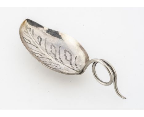A George III period silver tea caddy spoon by IT, 8.7cm long and 7g, in the form of a tea leaf with coiled handle, Birmingham