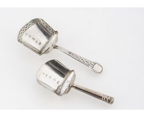 Two George III period silver tea caddy spoons by Samuel Pemberton, both of shovel form, one 6.9cm and 6.2g, the other 8.3cm l