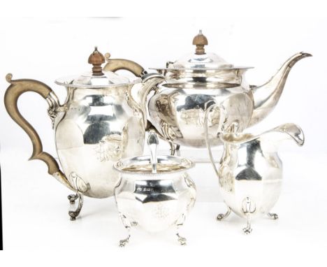 A Victorian four piece silver tea set by E &amp; D Co, with teapot, hot water pot, sugar basin and milk jug, each marked with