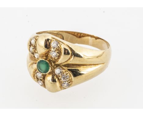 A continental yellow metal green paste and colourless paste cluster ring, marked to exterior with 'Donkey head' strike marks,