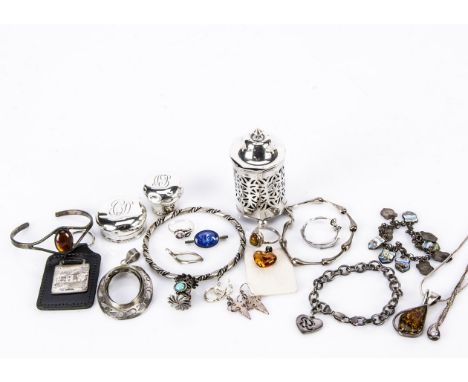 A collection of silver,  including a silver pepper missing one foot, a two amber pendant, one bangle, bracelets, an enamel so