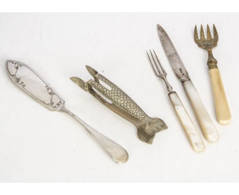 A Victorian silver and mother of pearl dessert knife and fork, together with a pair of silver plated fish shaped tongs, a pla