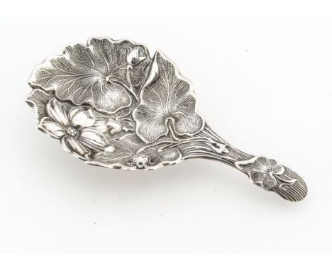 A Victorian period silver tea caddy spoon by A.H, 8cm and 11.3g, with embossed pretty leaf and flower design to bowl and hand