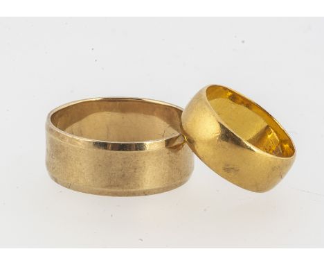 A George V 22ct gold flattened wedding band,  the slightly domed band, 6.6 mm wide ring size I, Birmingham 1911, 5.6g togethe
