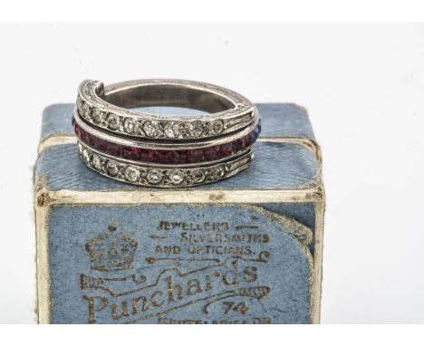 A silver paste set 'Night and Day' ring, the full eternity set with blue and red square cut paste stones, with two hinged hal