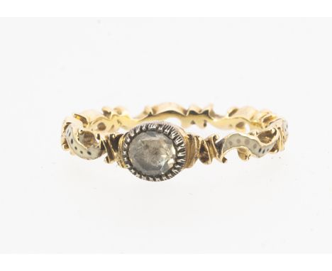 A 17th century diamond and enamel decorative ring,  the rose cut diamond, in basket and rubbed over setting, having scroll an