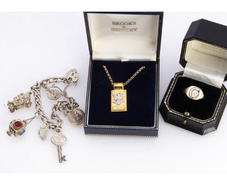 A 9ct gold Brooks &amp; Bentley diamond set eagle pendant, titled 'The Golden Eagle Diamond Pendant', tablet pendant with bel
