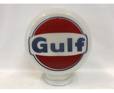 A Gulf glass petrol pump globe, the red colour repainted to both sides, otherwise in good condition. 