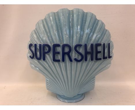 A Continental blue Super Shell glass petrol pump globe in good condition. 