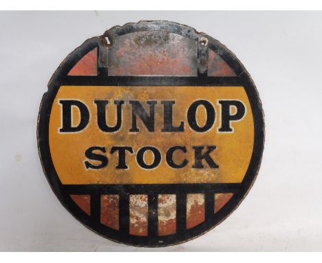 A Dunlop Stock circular double sided enamel sign, 18" diameter.
