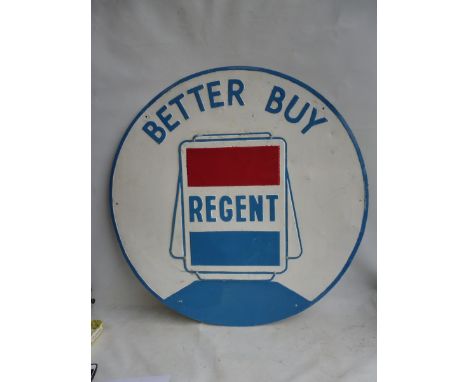 A Regent two piece circular tin advertising sign with central globe motif, 32" diameter.