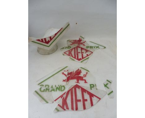 A Kieft Grand Prix glass petrol pump globe, smashed, appears incomplete.