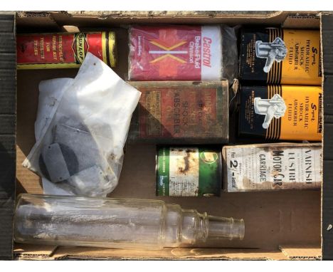 A box of assorted oil cans etc. including Castrol and Dunlop.