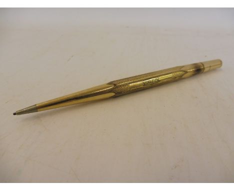 A Vigzol propelling pencil, gold plated.