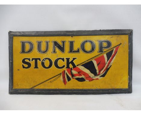 A rare and early Dunlop Stock cardboard and paper pictorial advertising sign, in good original condition, 24 1/2 x 12 1/2". 