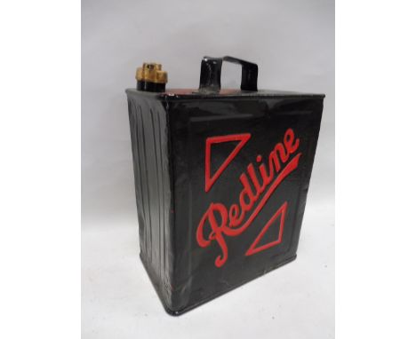 A Redline two gallon petrol can with original cap by Valor, dated July 1937. 