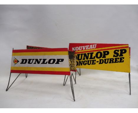 Two Dunlop folding forecourt tyre stands. 