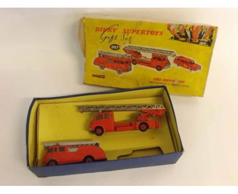 Boxed Dinky Toy gift set, number 957 Fire Service, to include a fire engine with turntable and fire escape No 956, a further 