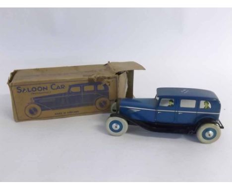 Chad Valley boxed tin plate clockwork saloon car, painted in blue and black, 24cms long 