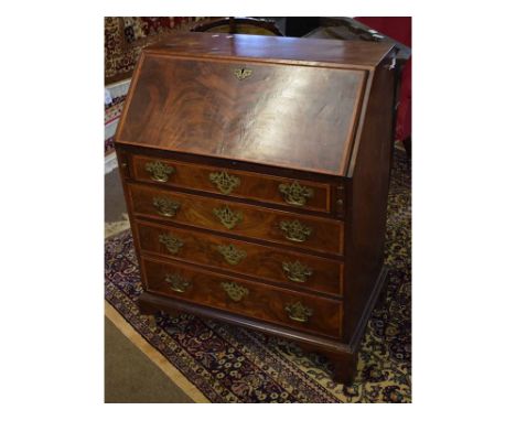 Georgian figured mahogany bureau with drop front over four full width drawers, raised on bracket feet with satinwood draw fro