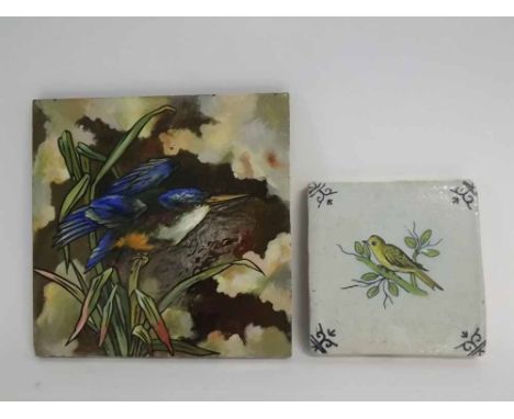 19th century Delft tile with central painted bird, together with a further Minton Hollins & Co tile with an enamel painted ki