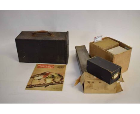 Box to include an Ensign tin cased Magic Lantern projector with leather topped handle, together with a large quantity of mixe