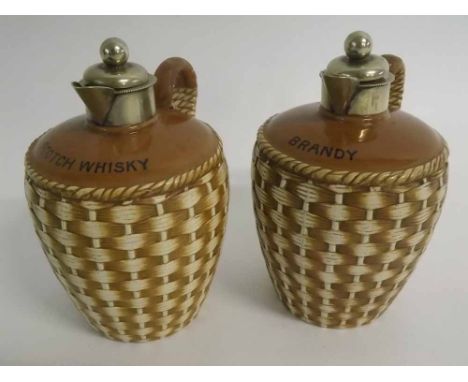 Pair of English Taylor & Tunnicliffe Brandy and Scotch Whisky flasks with silver plated tops and both with damaged handles, 1